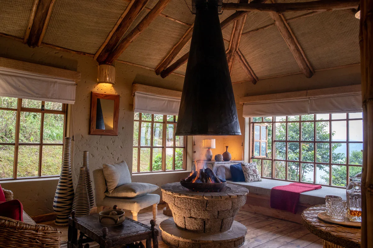 Fireplace sitting area in a deluxe room at Virunga Lodge